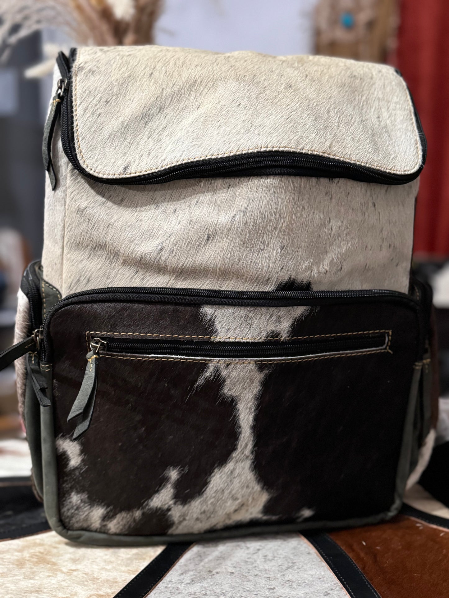 cowhide traveler backpack