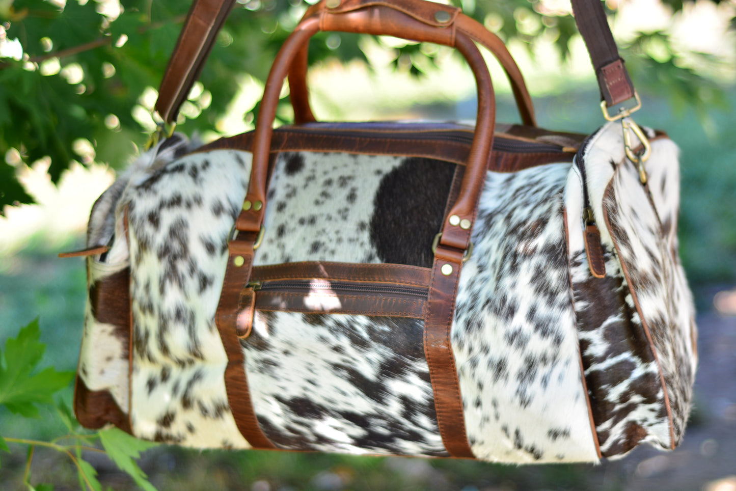 cowhide duffle large with side pocket