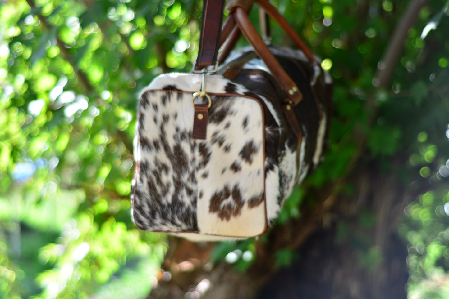 cowhide duffle large with side pocket