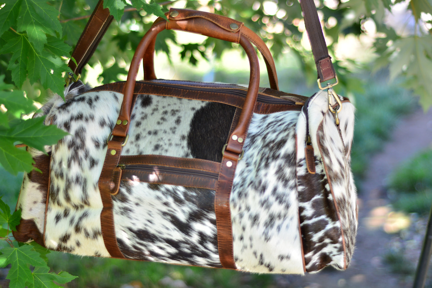 cowhide duffle large with side pocket