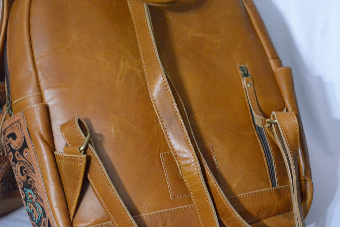 Tooled horse blanket and hide backpack