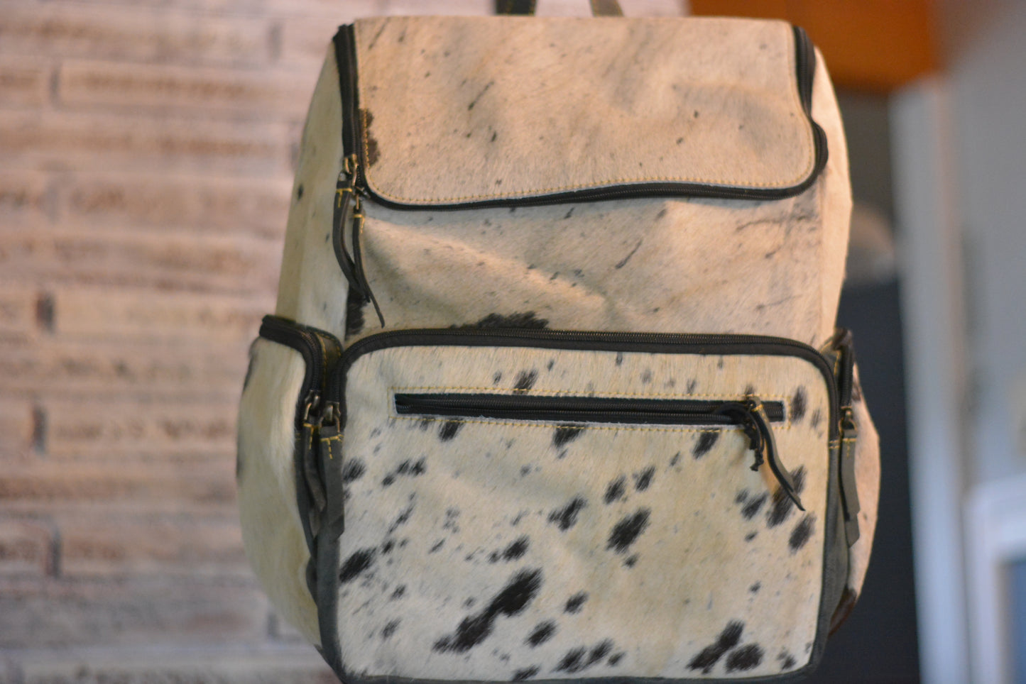 cowhide traveler backpack