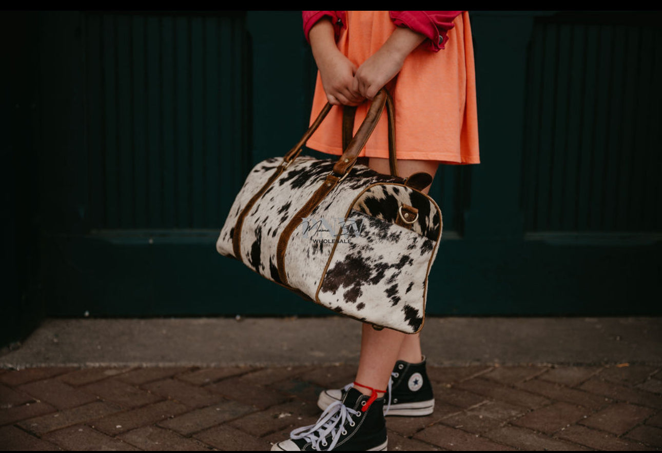 Full cowhide duffle.