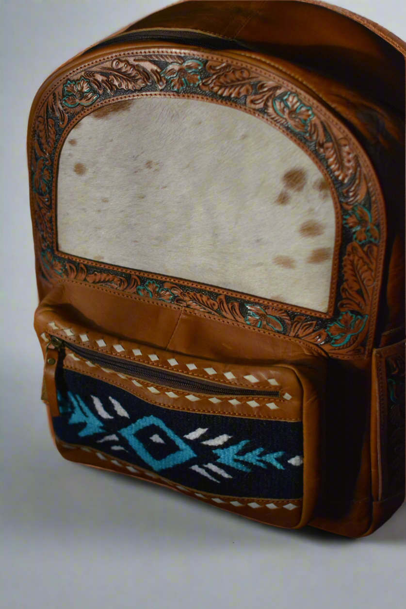 Tooled horse blanket and hide backpack