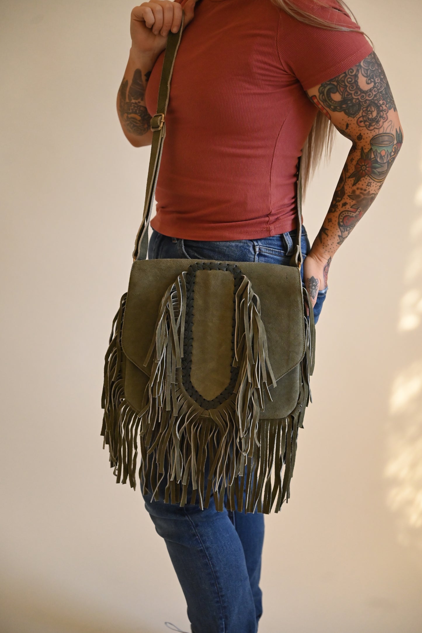 Suede fringe allure