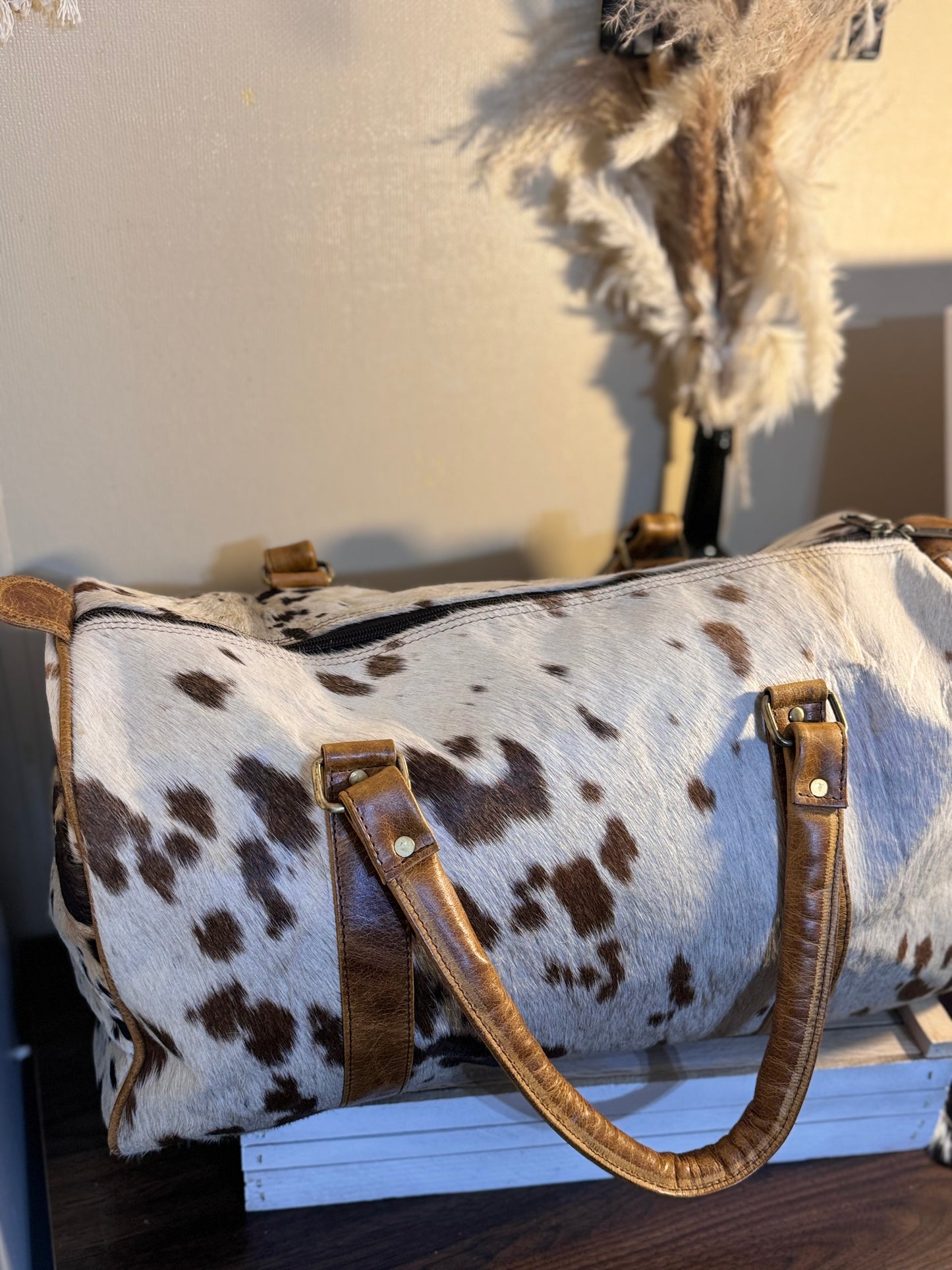 Full cowhide duffle.