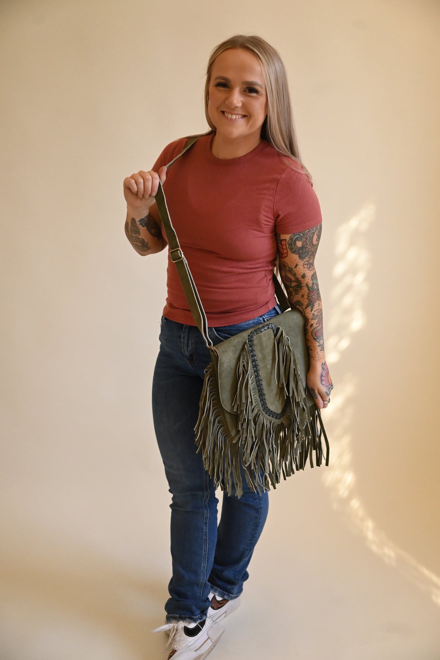 Suede fringe allure
