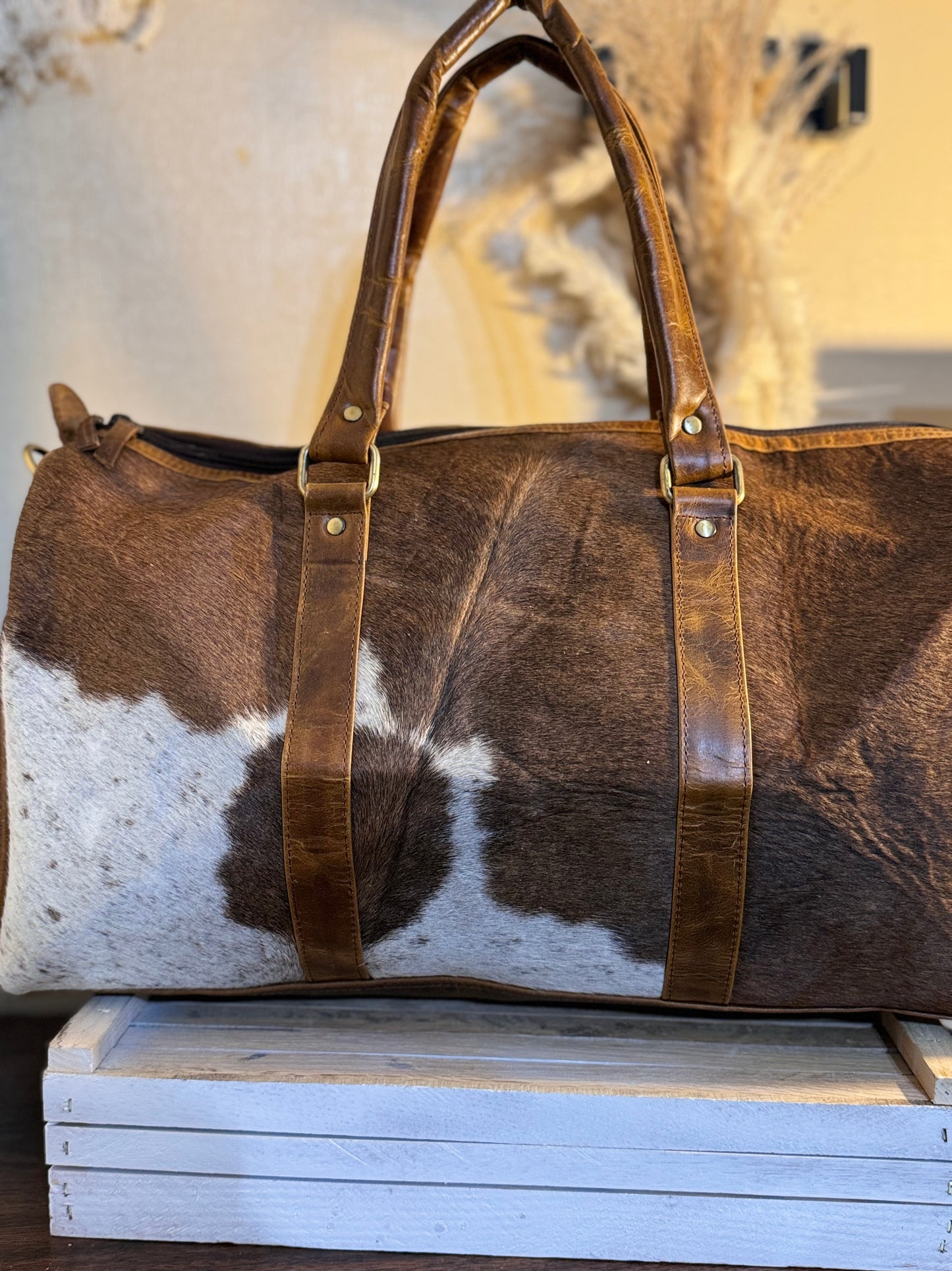 Full cowhide duffle.