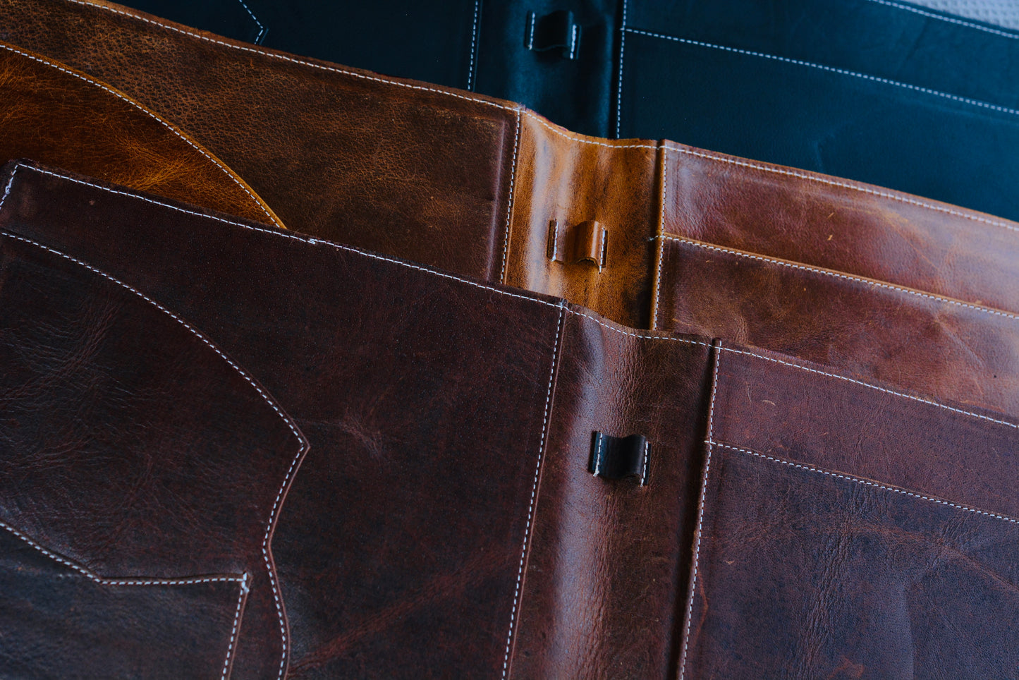 Boot stitch suede portfolios
