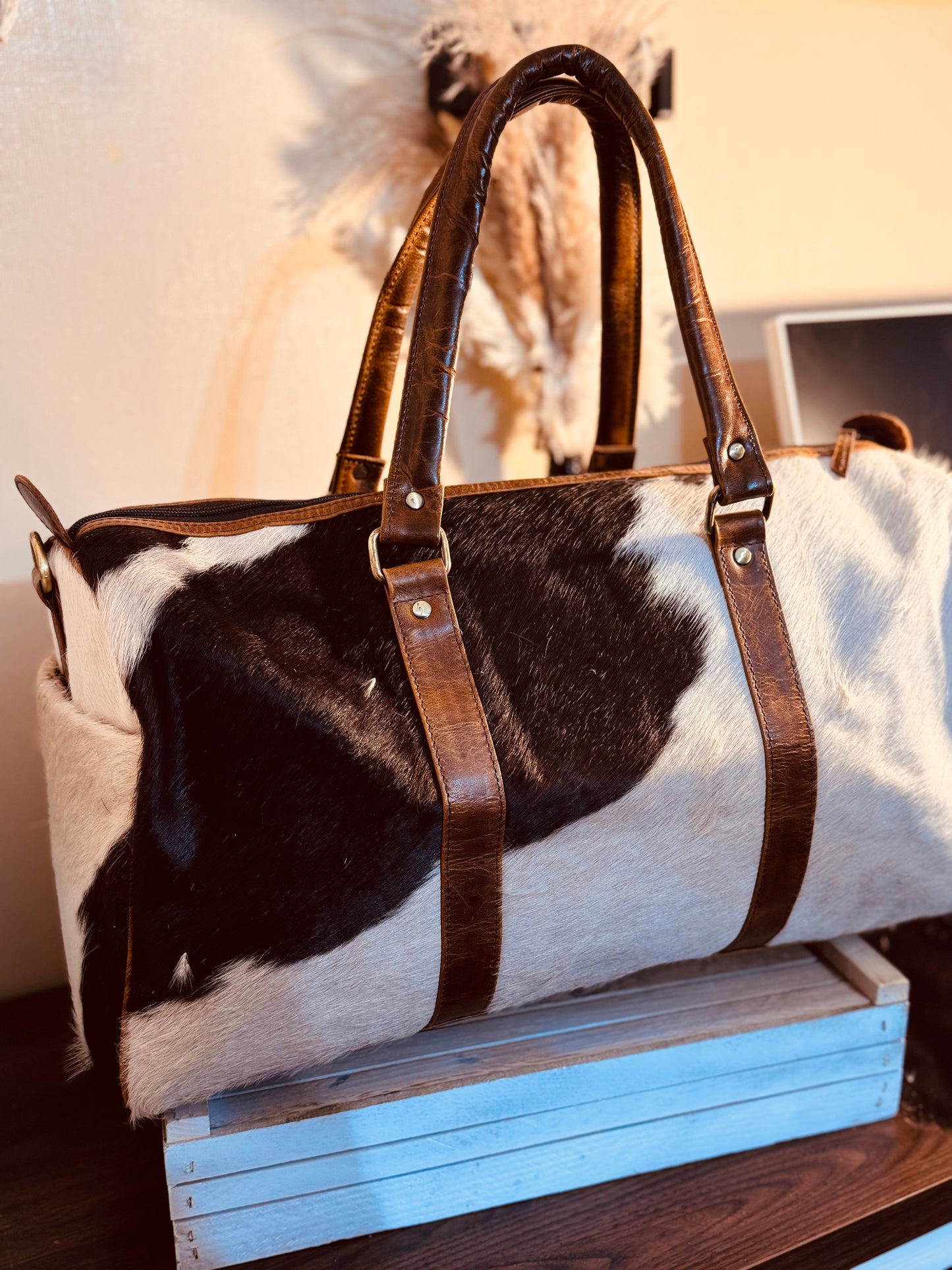 Full cowhide duffle.