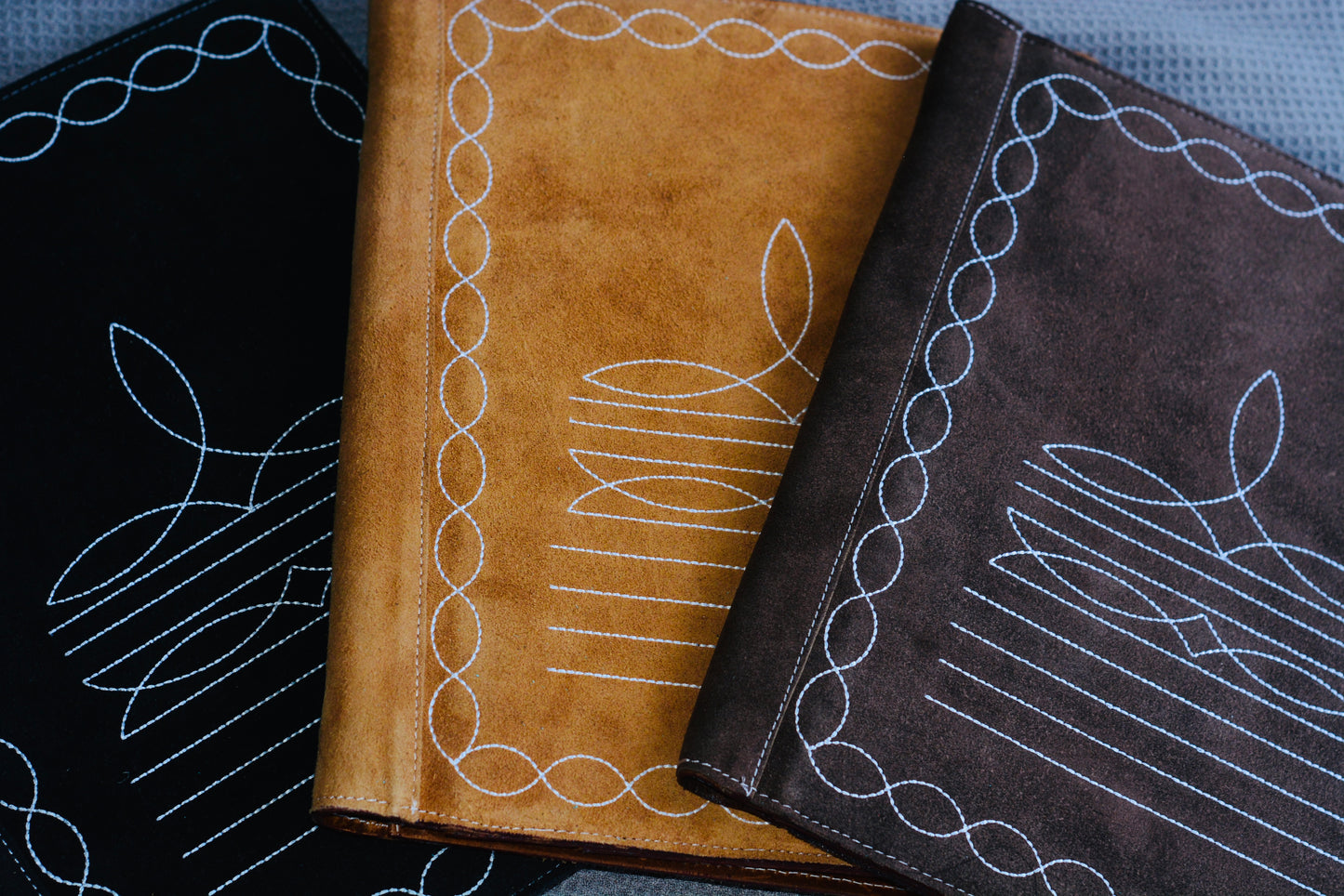 Boot stitch suede portfolios