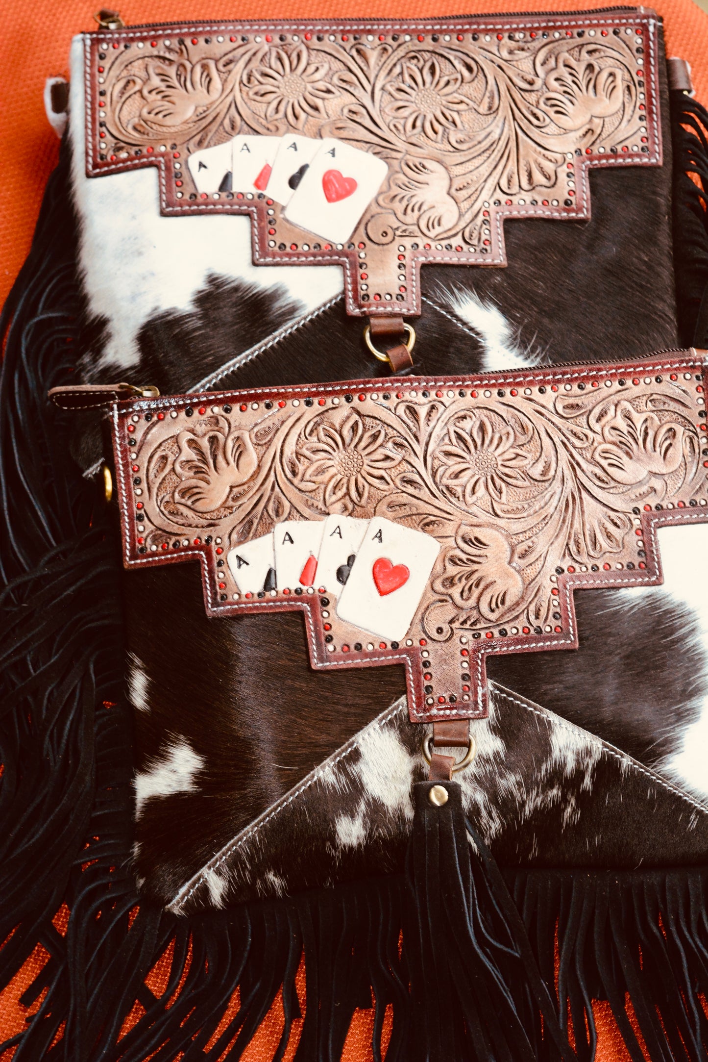 Ace's cowhide tooled crossbody bag.
