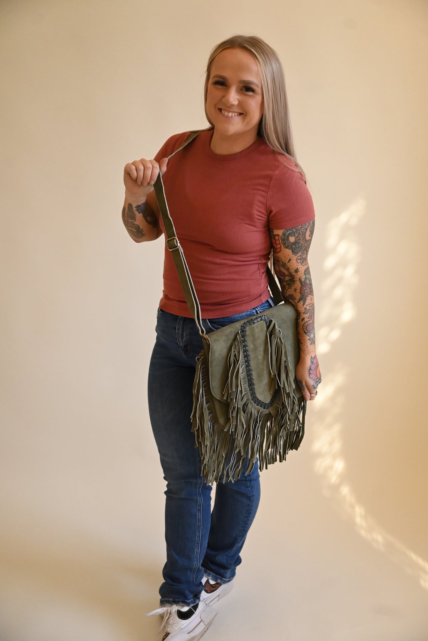 Suede fringe allure