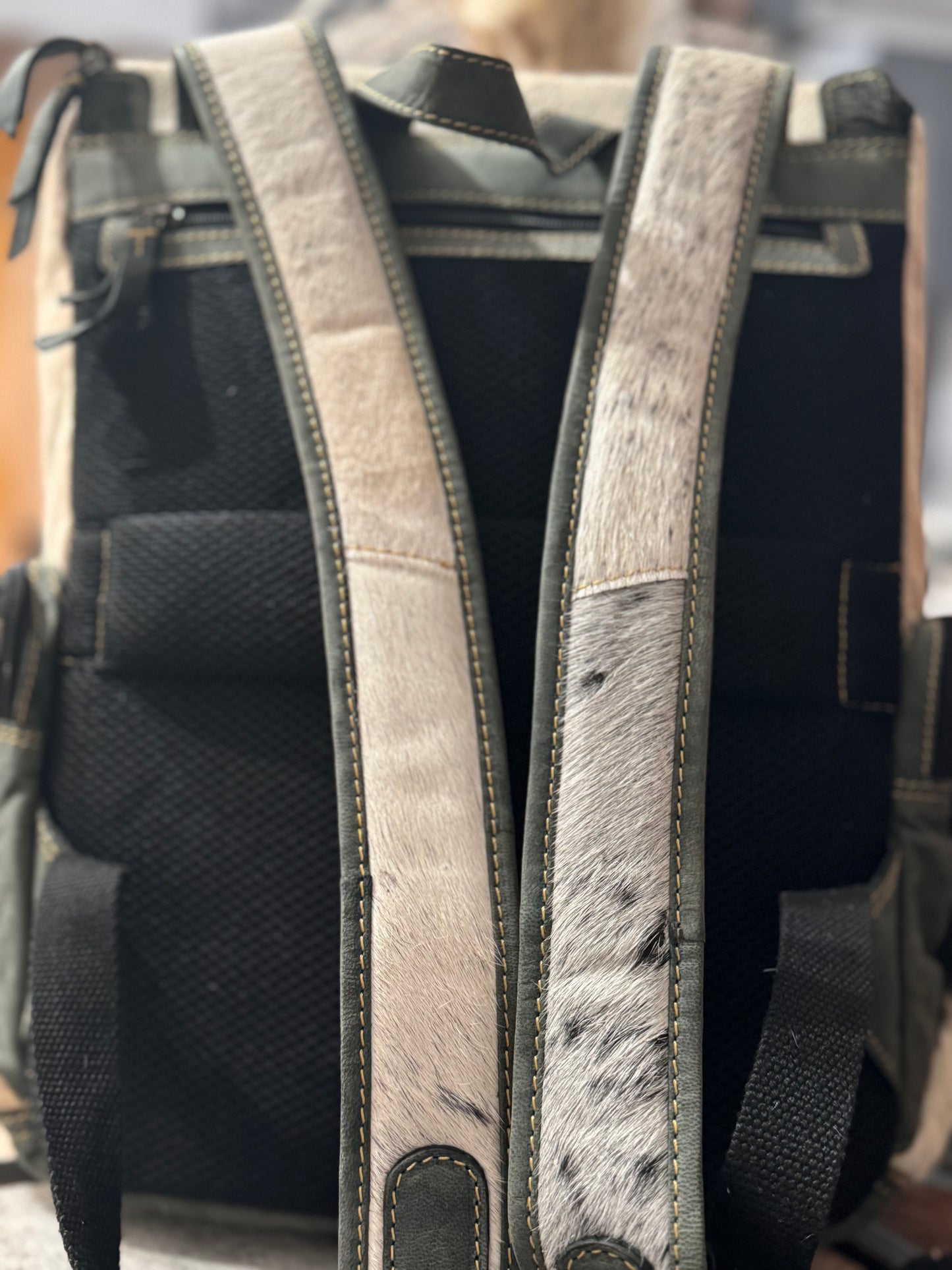 cowhide traveler backpack