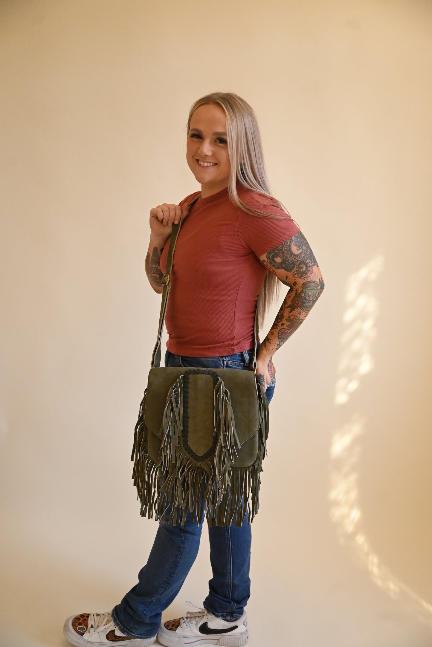 Suede fringe allure
