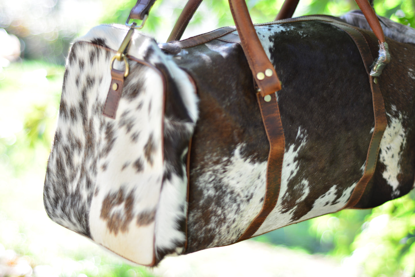 cowhide duffle large with side pocket