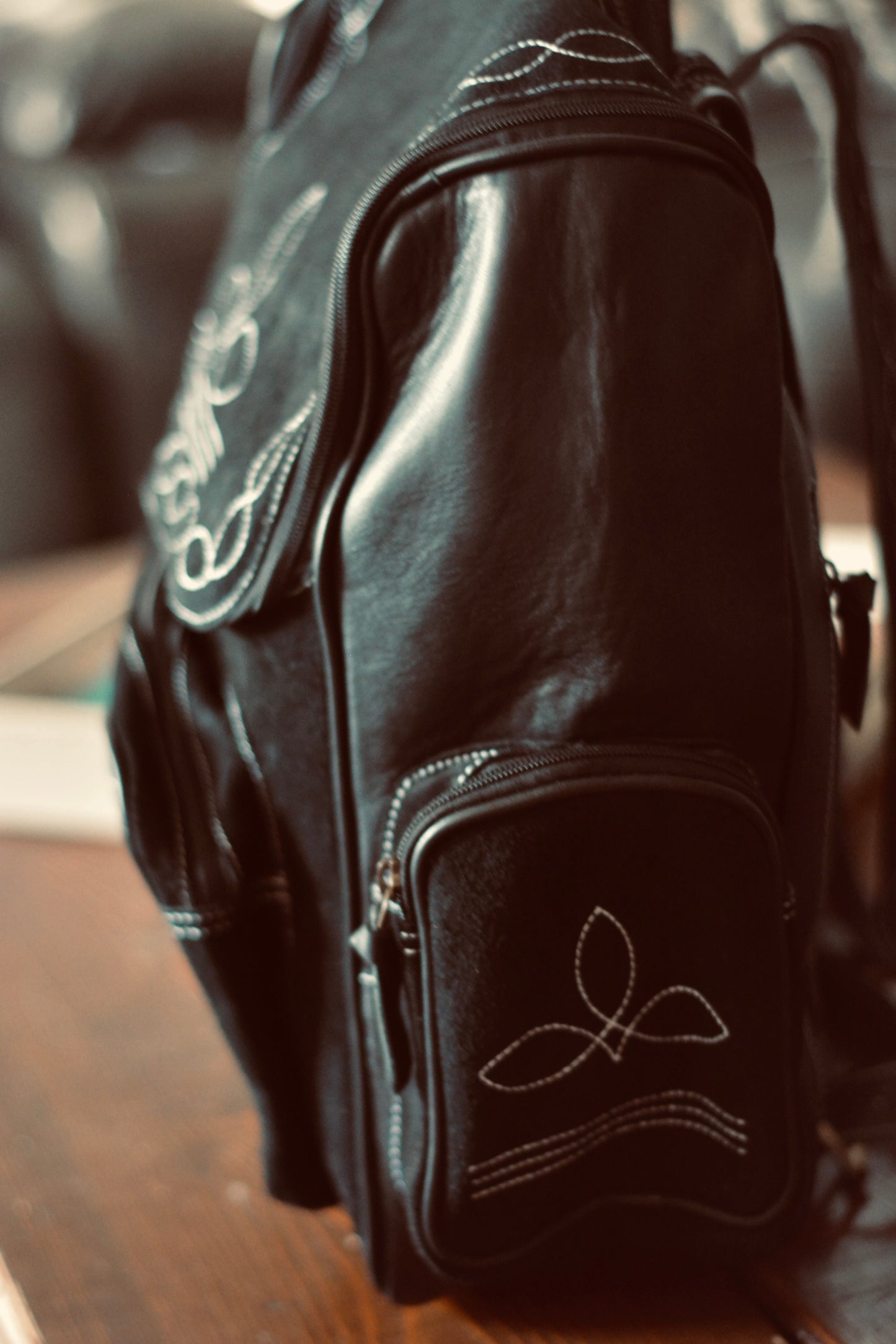 Genuine suede boot stitched backpack