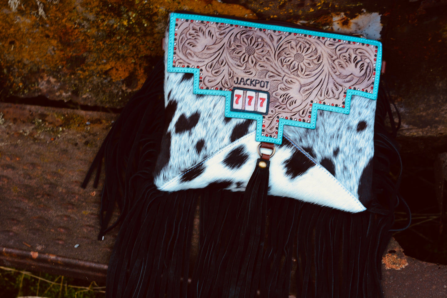 Triple 7’s cowhide fringe bag