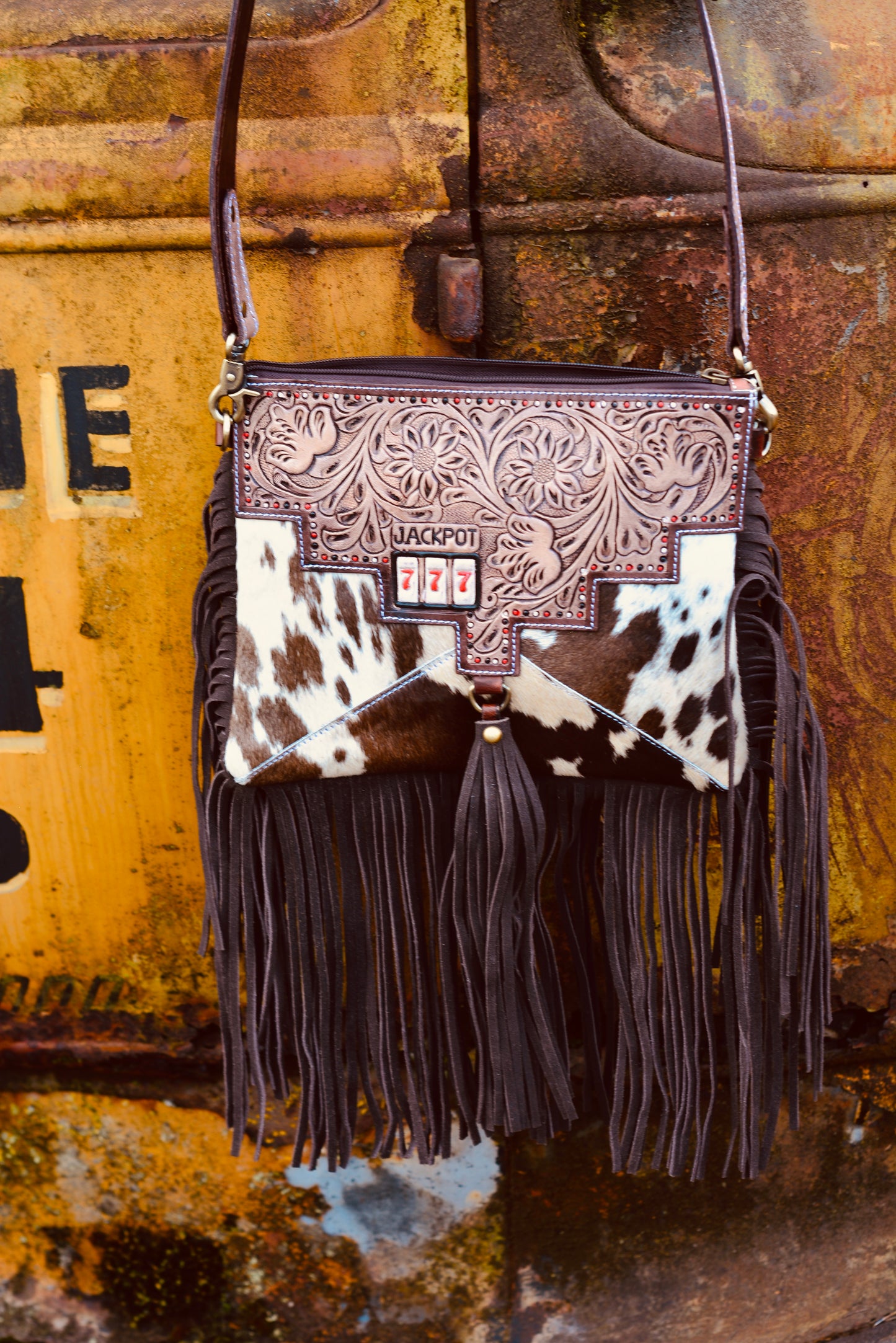 Triple 7’s cowhide fringe bag