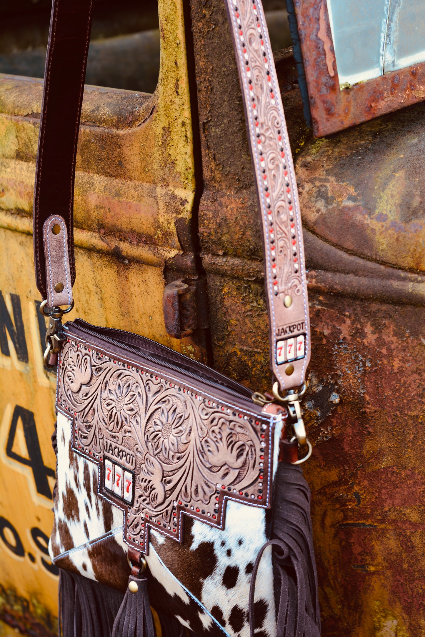 Triple 7’s cowhide fringe bag