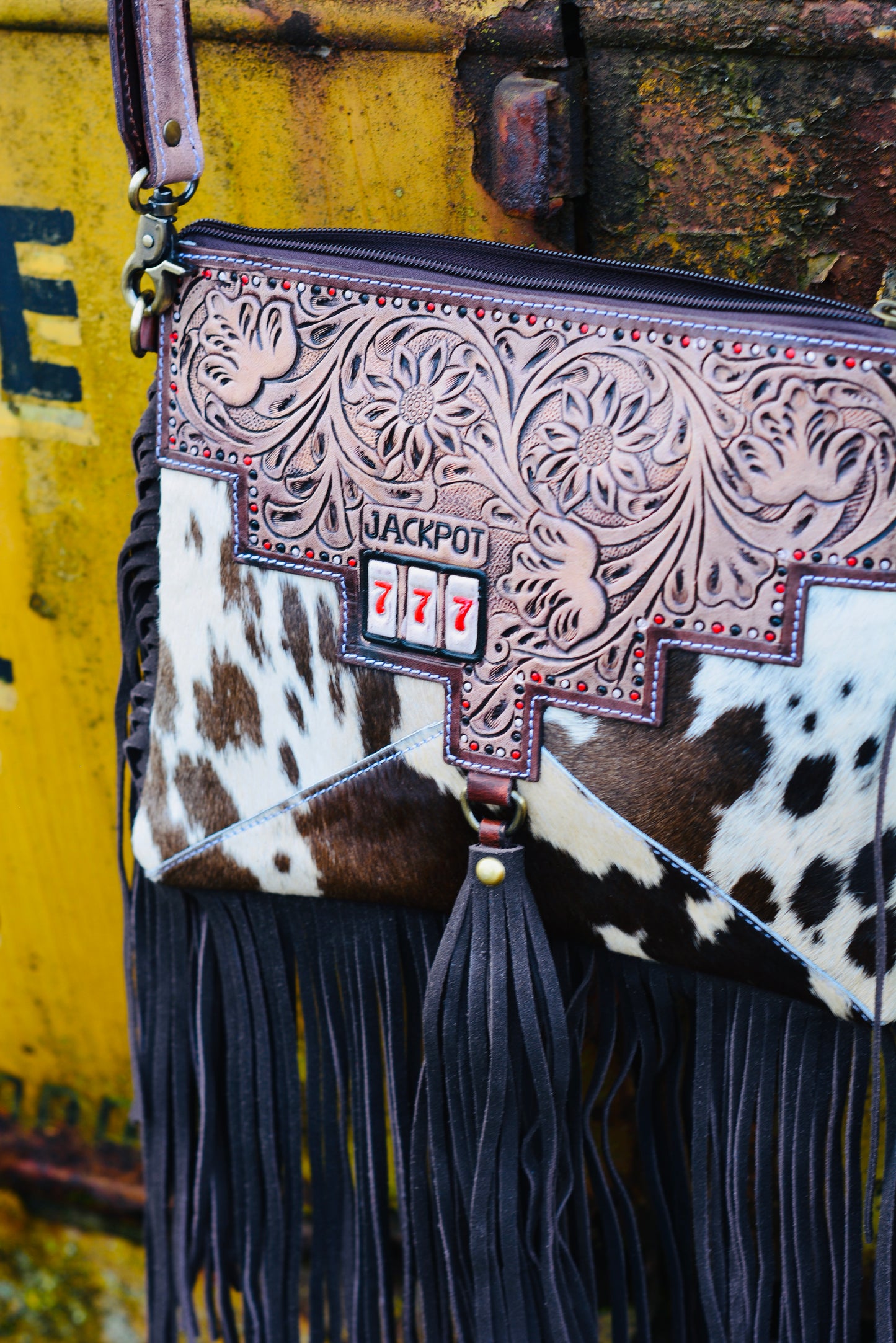Triple 7’s cowhide fringe bag
