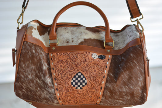 Tooled checker cowhide duffle bag