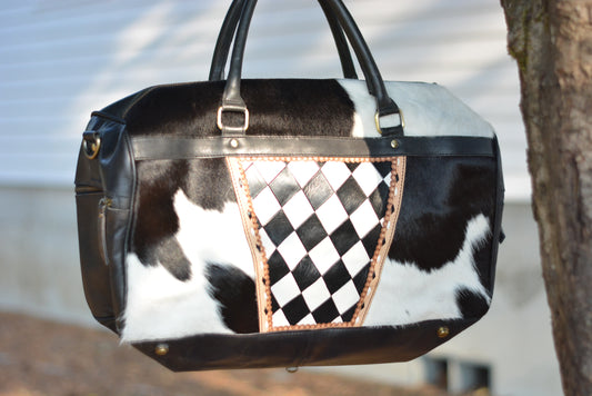 Tooled checker black cowhide duffle bag
